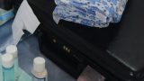 צלם לברית מתעד את הרבי מליובאוויטש ליד ערכת המוהל